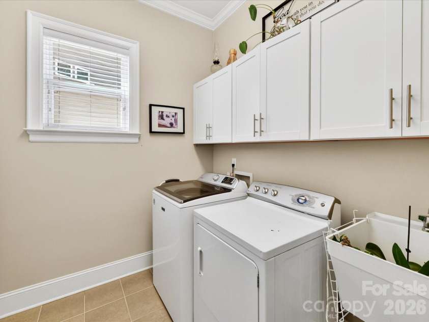 1548 Afton Way, Fort Mill, SC 29708.  MLS# CAR4372312, YatesRealty ID 21545. Main Level Laundry with cabinets