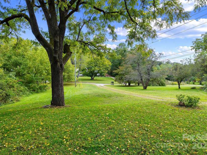 158 Allen Drive, Fletcher, NC 28732.  MLS# CAR4185254, YatesRealty ID 21548. And mature trees