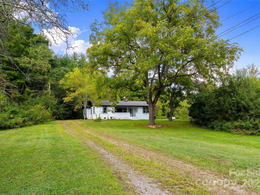 158 Allen Drive, Fletcher, NC 28732.  MLS# CAR4185254, YatesRealty ID 21548. There a huge yard...