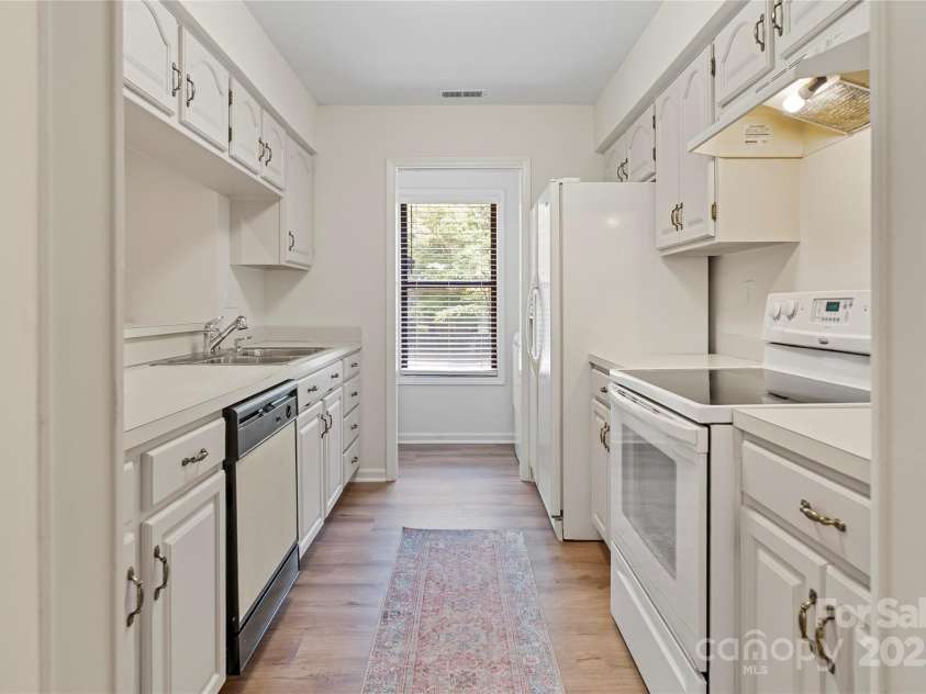407 Sweetgum Drive, Fort Mill, SC 29715.  MLS# CAR4272607, YatesRealty ID 21552. Freshly painted cabinetry throughout