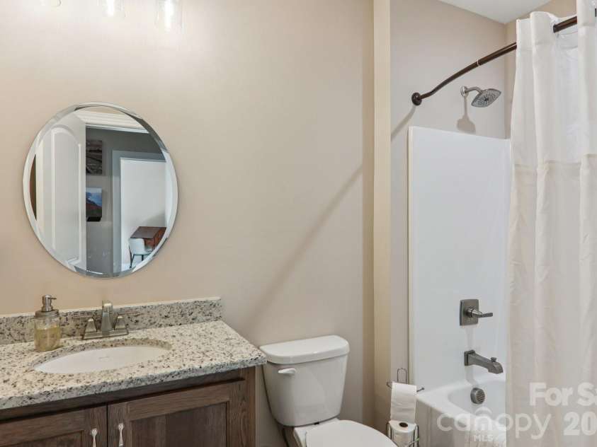 1367 Old Mill Road, Hendersonville, NC 28792.  MLS# CAR4319973, YatesRealty ID 21556. Lower level bathroom