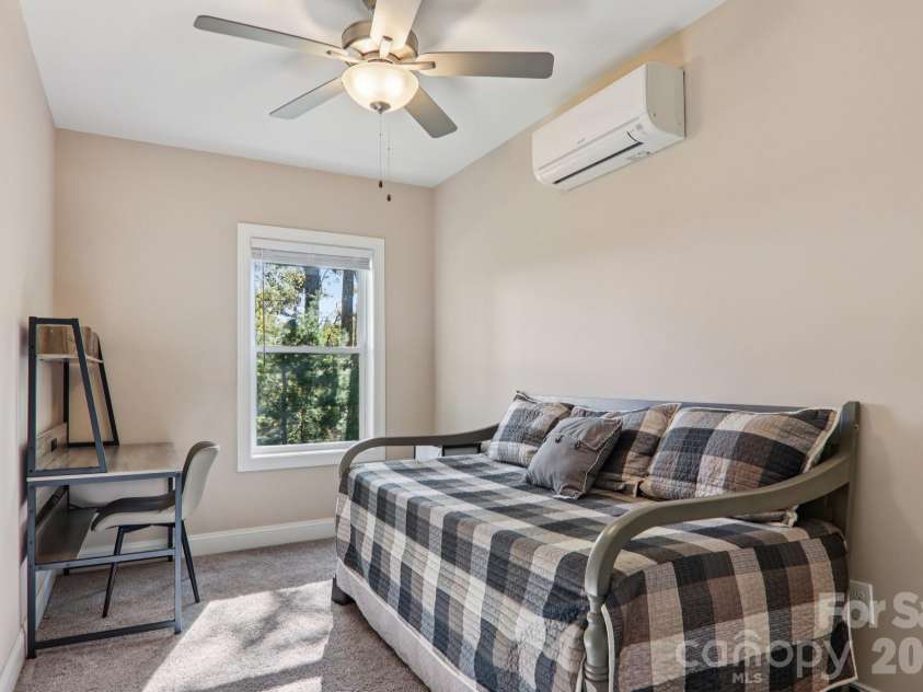 1367 Old Mill Road, Hendersonville, NC 28792.  MLS# CAR4319973, YatesRealty ID 21556. Lower level bedroom