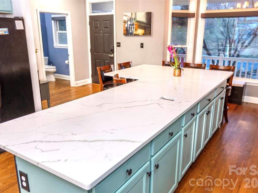 5 Gemini Heights, Weaverville, NC 28787.  MLS# CAR4341848, YatesRealty ID 21565. Kitchen toward entrance