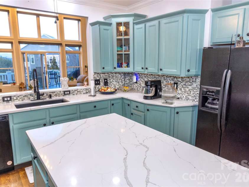 5 Gemini Heights, Weaverville, NC 28787.  MLS# CAR4341848, YatesRealty ID 21565. Kitchen toward livingroom