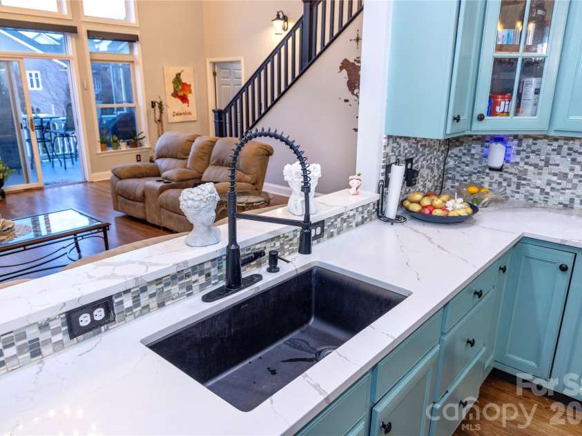 5 Gemini Heights, Weaverville, NC 28787.  MLS# CAR4341848, YatesRealty ID 21565. Kitchen toward livingroom