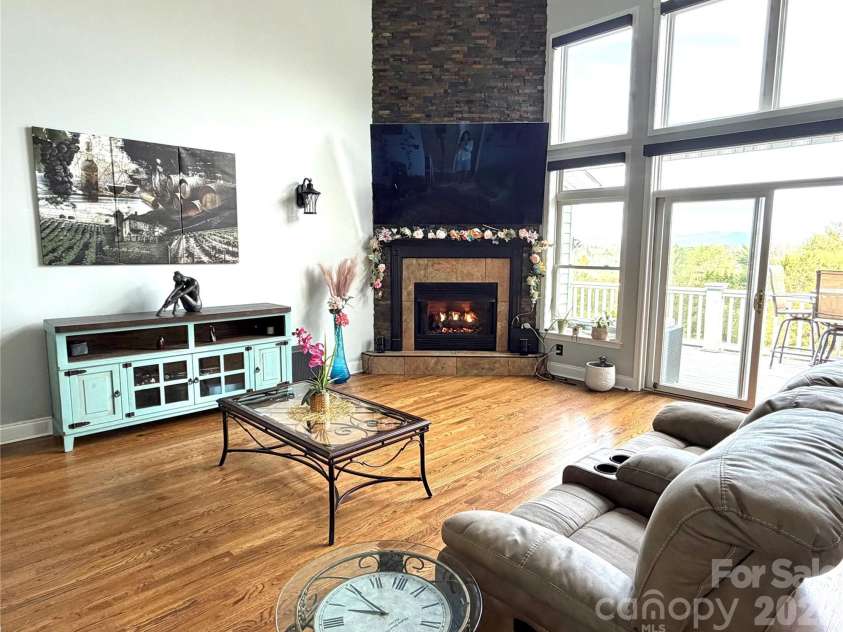 5 Gemini Heights, Weaverville, NC 28787.  MLS# CAR4341848, YatesRealty ID 21565. Livingroom with fireplace