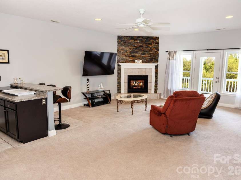 5 Gemini Heights, Weaverville, NC 28787.  MLS# CAR4341848, YatesRealty ID 21565. Lower family room with kitchenett