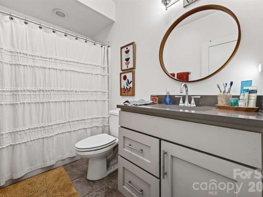 62 Dillingham Road, Asheville, NC 28805.  MLS# CAR4370349, YatesRealty ID 21567. Full bathroom on lower level