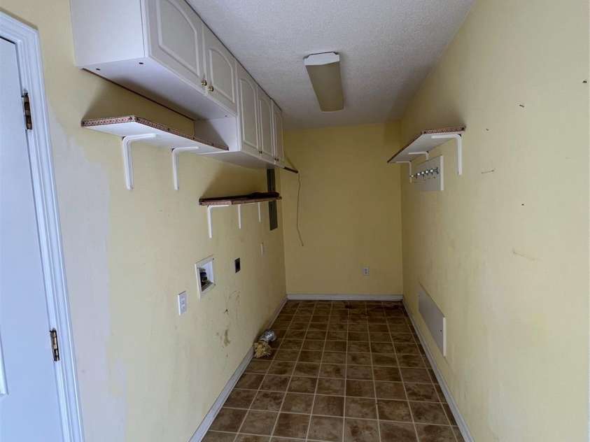 25397 Stony Mountain Road, Albemarle, NC 28001.  MLS# CAR4314846, YatesRealty ID 2157. Laundry Room 