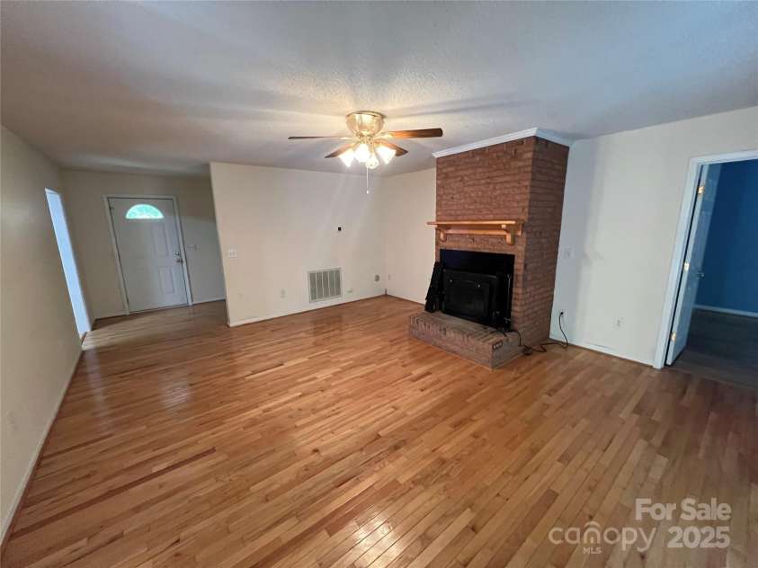 25397 Stony Mountain Road, Albemarle, NC 28001.  MLS# CAR4314846, YatesRealty ID 2157. Living Room