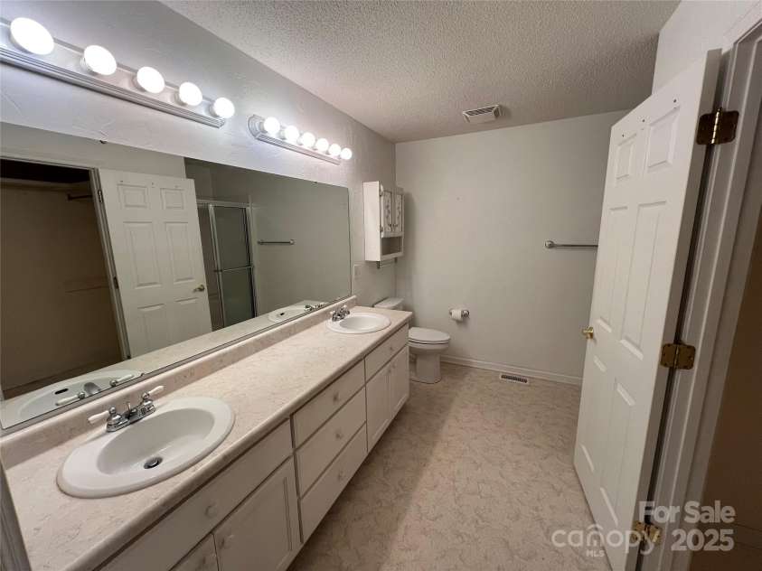 25397 Stony Mountain Road, Albemarle, NC 28001.  MLS# CAR4314846, YatesRealty ID 2157. Primary Bathroom