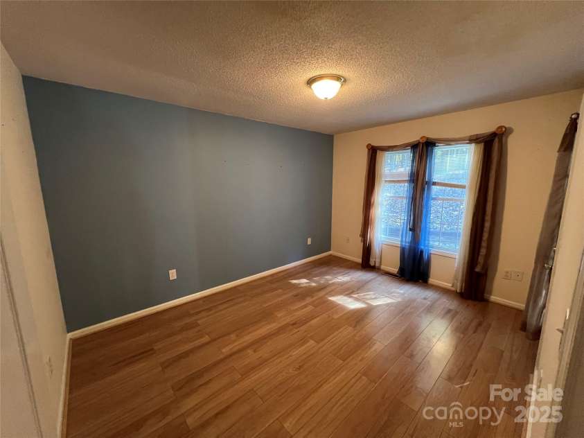 25397 Stony Mountain Road, Albemarle, NC 28001.  MLS# CAR4314846, YatesRealty ID 2157. Primary Bedroom 