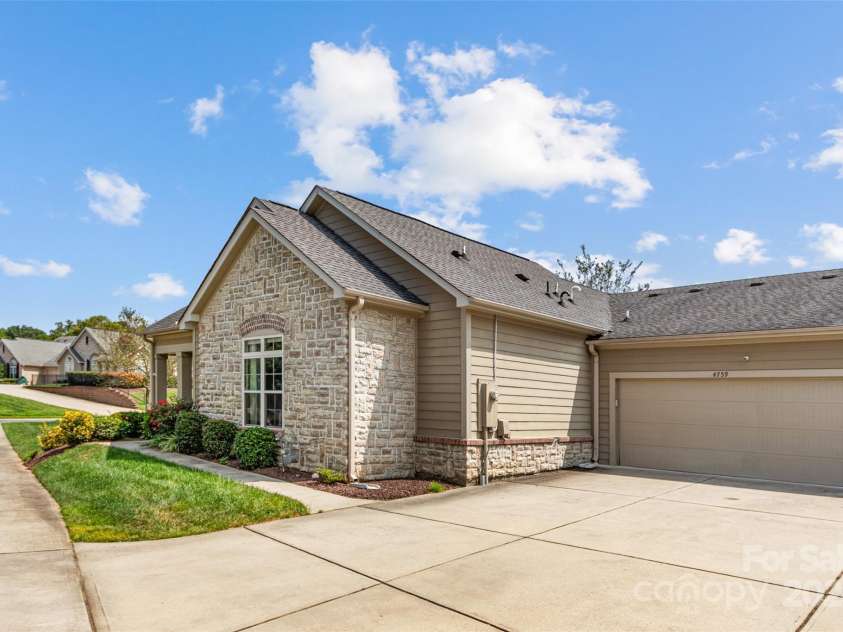 4759 Polo Gate Boulevard, Charlotte, NC 28216.  MLS# CAR4181175, YatesRealty ID 2157. Back garages