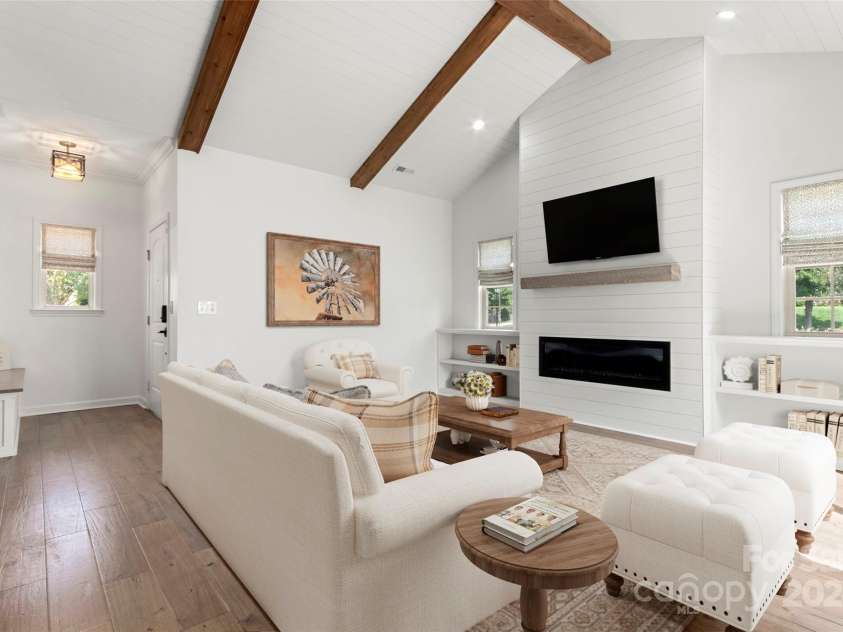 4759 Polo Gate Boulevard, Charlotte, NC 28216.  MLS# CAR4181175, YatesRealty ID 2157. Great room (virtually staged)