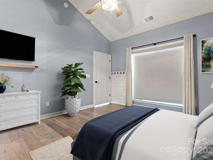 4759 Polo Gate Boulevard, Charlotte, NC 28216.  MLS# CAR4181175, YatesRealty ID 2157. Primary bedroom (virtually staged)