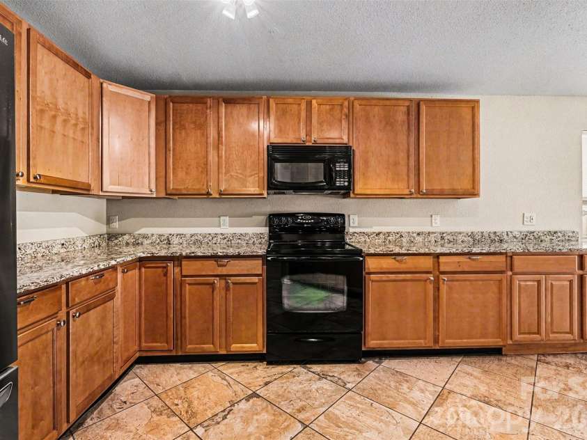 5671 Hammermill Drive, Harrisburg, NC 28075.  MLS# CAR4366194, YatesRealty ID 21571. 