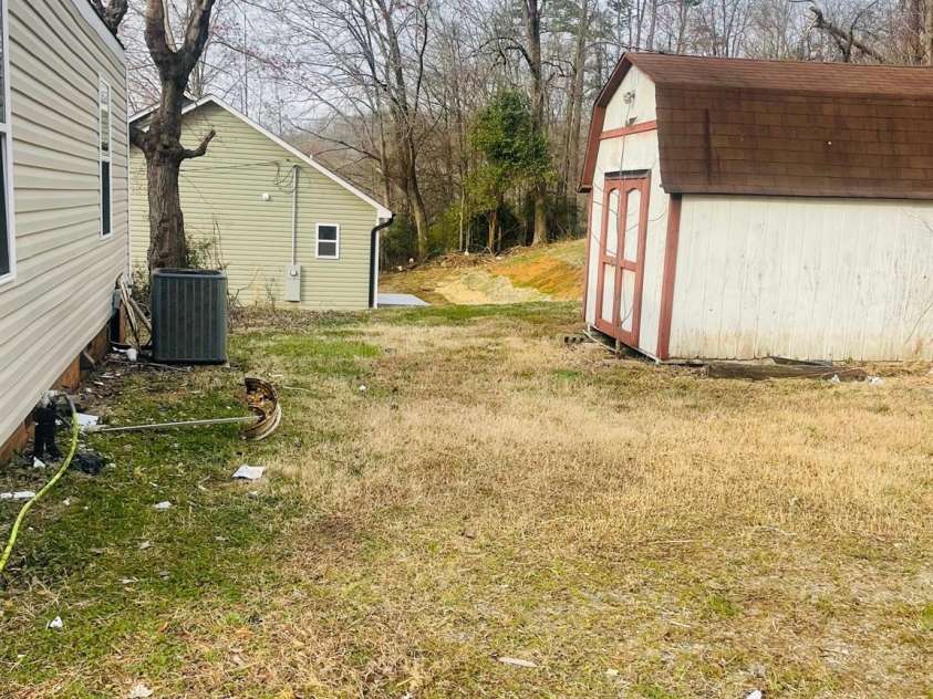 640 MCKEE Street, Albemarle, NC 28001.  MLS# CAR4212875, YatesRealty ID 21575. BACK YARD AND STORAGE