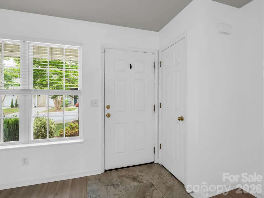 64 Lanceford Circle, Fletcher, NC 28732.  MLS# CAR4374412, YatesRealty ID 21576. Coat closet as you come in