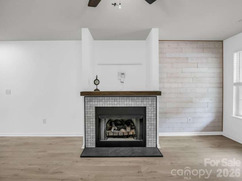 64 Lanceford Circle, Fletcher, NC 28732.  MLS# CAR4374412, YatesRealty ID 21576. Gas Logs and a place for the TV