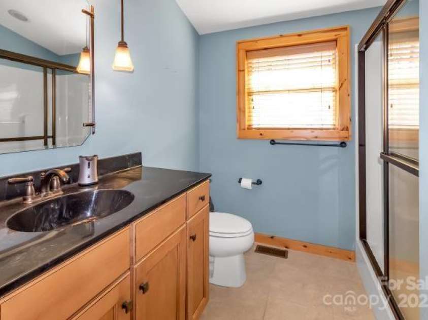 155 Iga Trail, Maggie Valley, NC 28751.  MLS# CAR4219511, YatesRealty ID 2158. Upper Bathroom