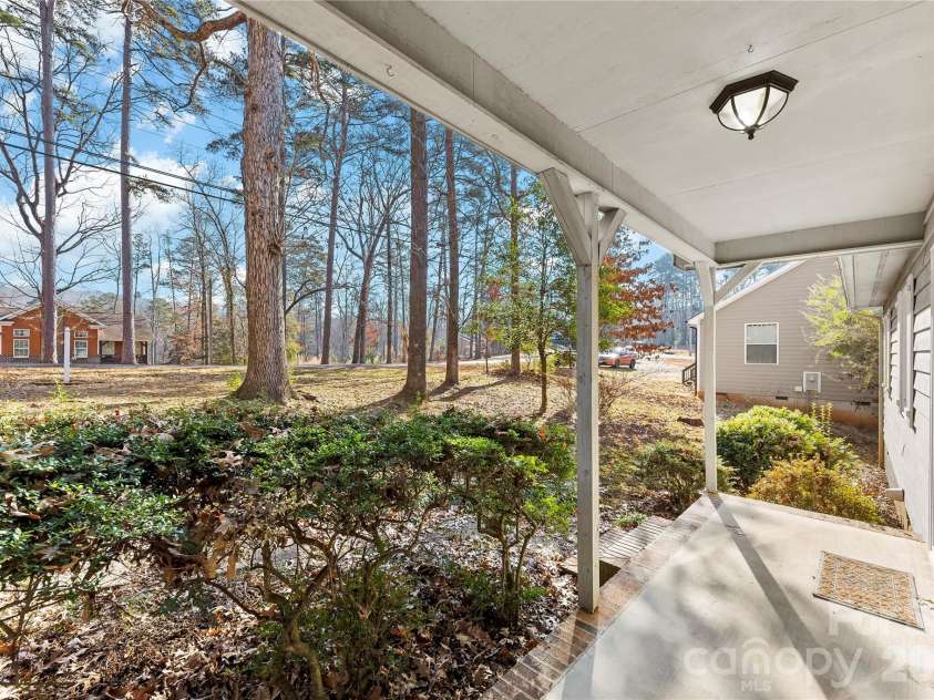 213 Woodrun Drive, Mount Gilead, NC 27306.  MLS# CAR4334949, YatesRealty ID 2158. A welcoming front porch that makes coming home feel comfortable and relaxed.