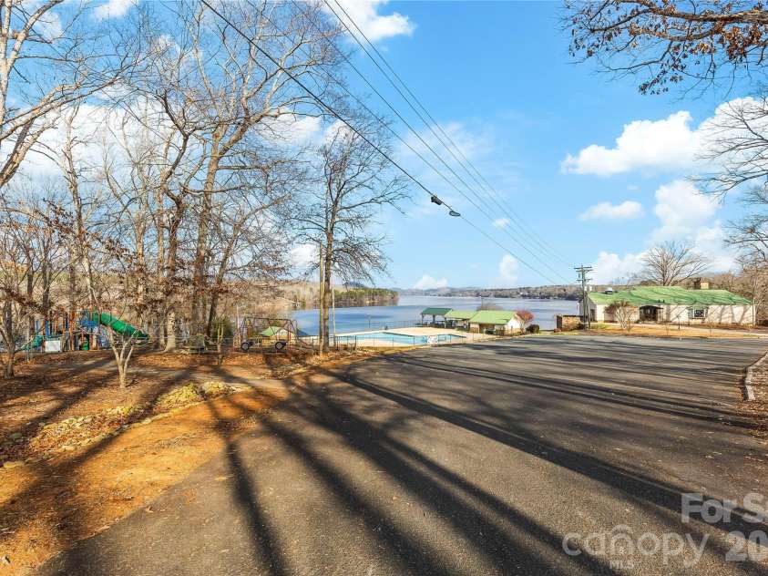 213 Woodrun Drive, Mount Gilead, NC 27306.  MLS# CAR4334949, YatesRealty ID 2158. Community amenities include a playground, pool, clubhouse, and boat docks — offering something for every season and every age.