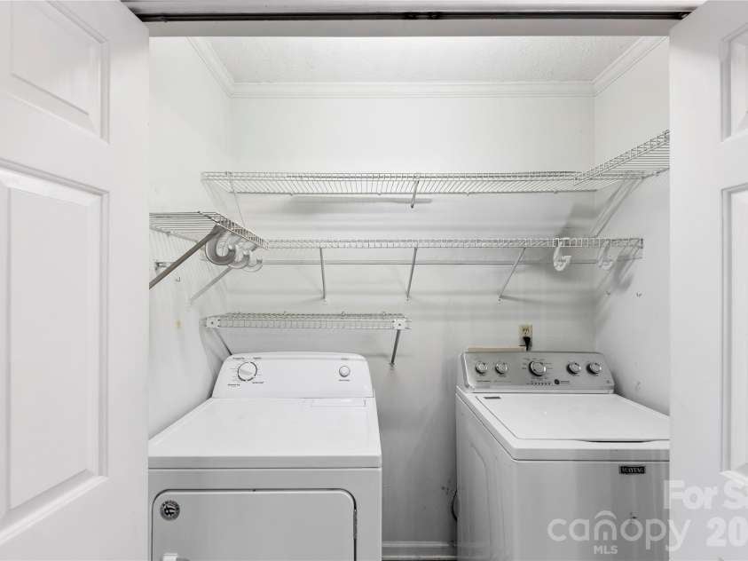 213 Woodrun Drive, Mount Gilead, NC 27306.  MLS# CAR4334949, YatesRealty ID 2158. Convenient laundry room designed for everyday functionality and easy upkeep.