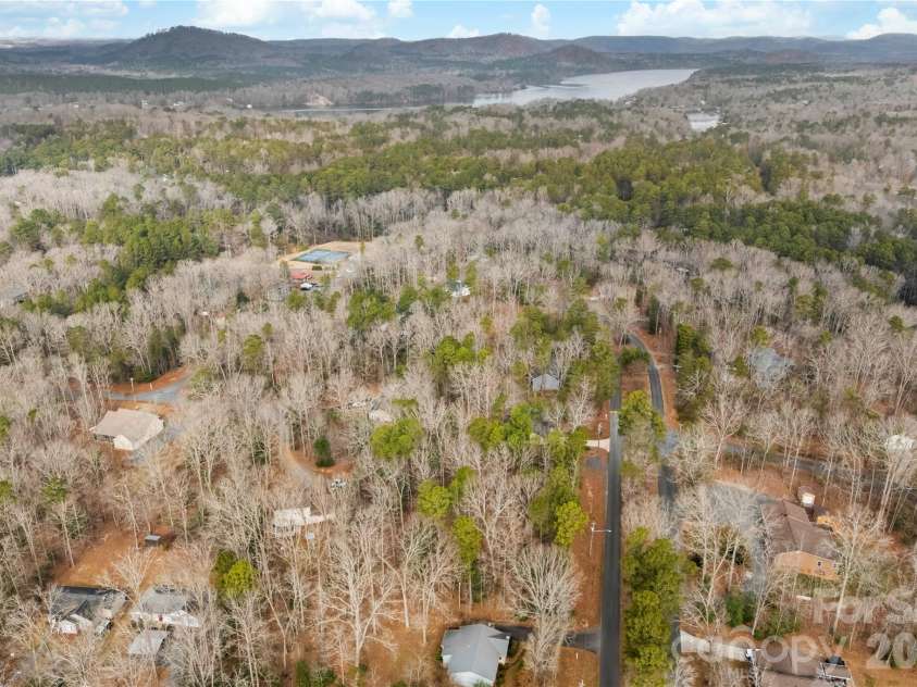 213 Woodrun Drive, Mount Gilead, NC 27306.  MLS# CAR4334949, YatesRealty ID 2158. Conveniently located near the lake, making it easy to enjoy boating, swimming, and dock days whenever the mood strikes.