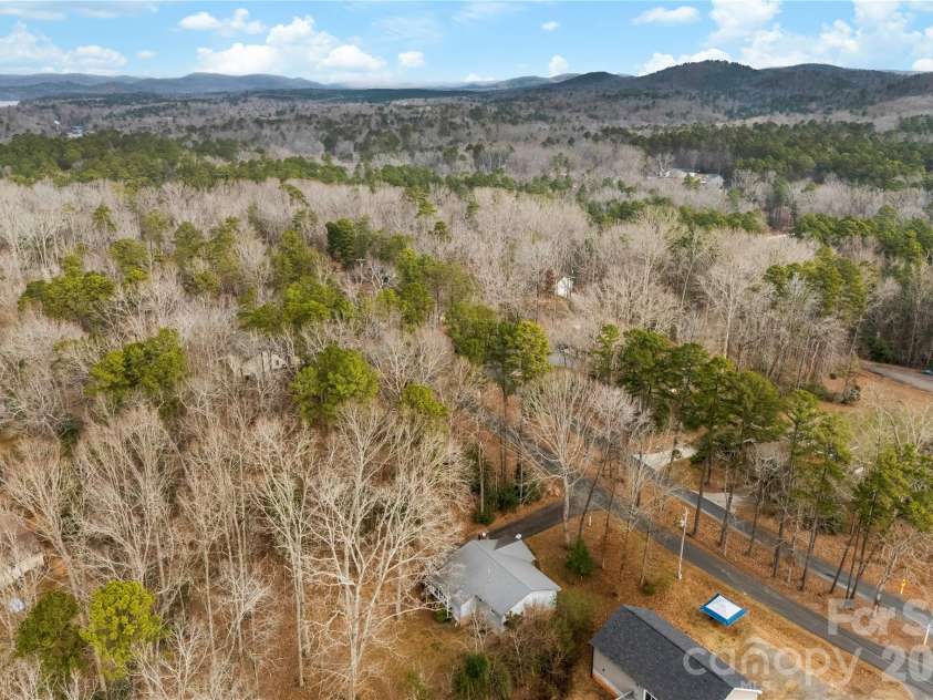 213 Woodrun Drive, Mount Gilead, NC 27306.  MLS# CAR4334949, YatesRealty ID 2158. Conveniently located near the lake, making it easy to enjoy boating, swimming, and dock days whenever the mood strikes.