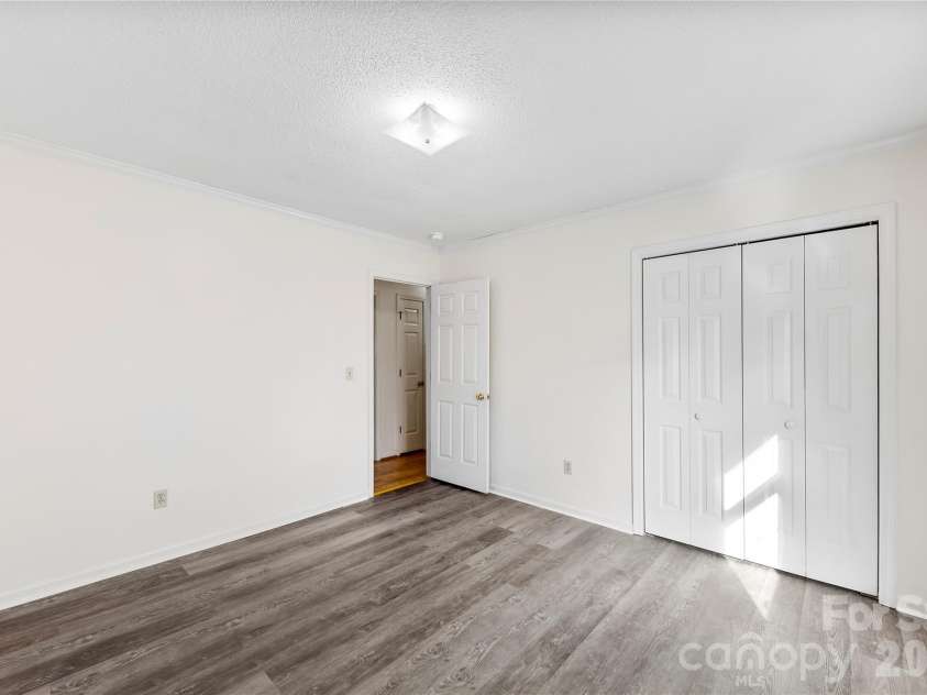 213 Woodrun Drive, Mount Gilead, NC 27306.  MLS# CAR4334949, YatesRealty ID 2158. Cozy guest bedrooms provide the perfect retreat for visitors enjoying time at the lake.