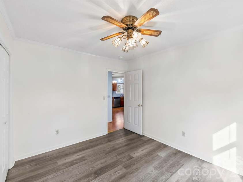 213 Woodrun Drive, Mount Gilead, NC 27306.  MLS# CAR4334949, YatesRealty ID 2158. Cozy guest bedrooms provide the perfect retreat for visitors enjoying time at the lake.