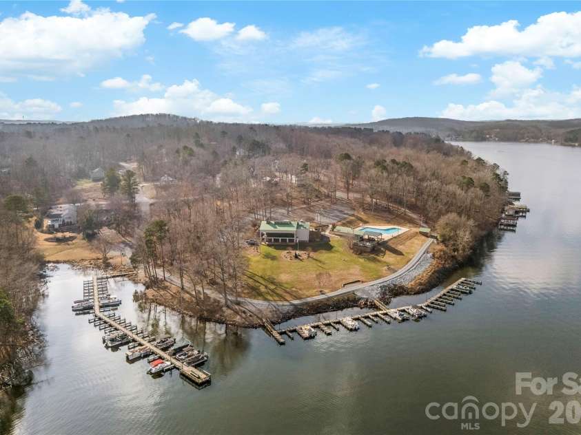 213 Woodrun Drive, Mount Gilead, NC 27306.  MLS# CAR4334949, YatesRealty ID 2158. Enjoy access to desirable community amenities including a clubhouse, pool, playground, sport courts, and boat docks — bringing the Lake Tillery lifestyle to your doorstep.