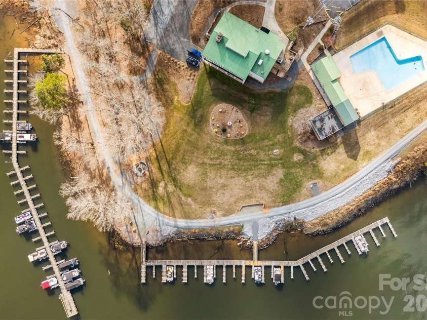 213 Woodrun Drive, Mount Gilead, NC 27306.  MLS# CAR4334949, YatesRealty ID 2158. Enjoy access to desirable community amenities including a clubhouse, pool, playground, sport courts, and boat docks — bringing the Lake Tillery lifestyle to your doorstep.