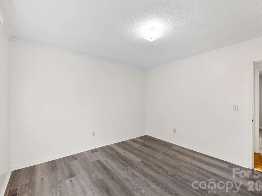 213 Woodrun Drive, Mount Gilead, NC 27306.  MLS# CAR4334949, YatesRealty ID 2158. Guest bedrooms are ideal for hosting friends and family, giving everyone their own space to unwind.