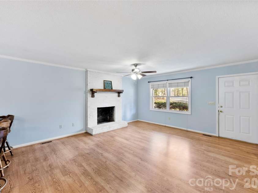 213 Woodrun Drive, Mount Gilead, NC 27306.  MLS# CAR4334949, YatesRealty ID 2158. Open-concept living and kitchen create a laid-back space where lake weekends turn into long, easy nights.