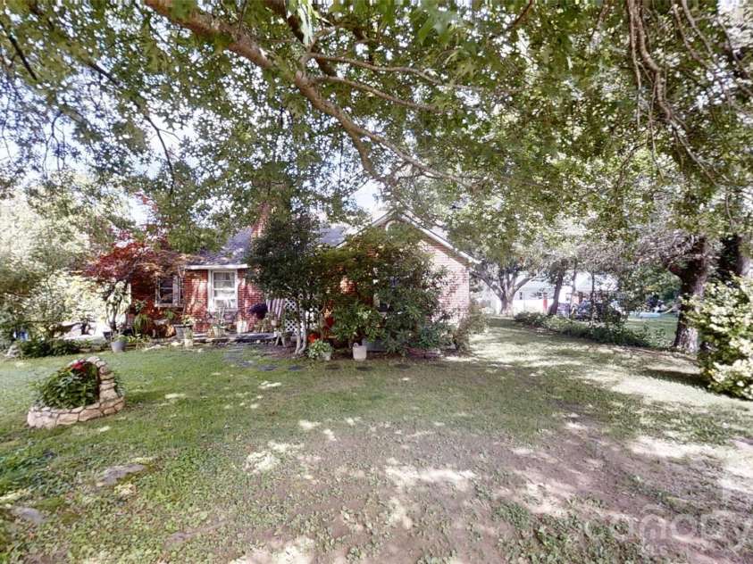 21 Maple Avenue, Candler, NC 28715.  MLS# CAR4273168, YatesRealty ID 21580. View from the front