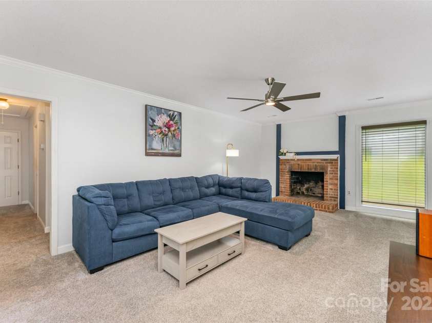 706 Hammermill Road, Charlotte, NC 28270.  MLS# CAR4267358, YatesRealty ID 21586. Main living area with updated carpet and paint.