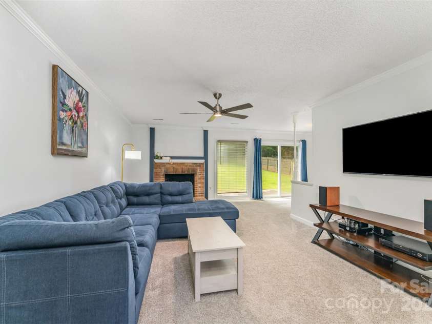 706 Hammermill Road, Charlotte, NC 28270.  MLS# CAR4267358, YatesRealty ID 21586. Main living area with updated carpet and paint.