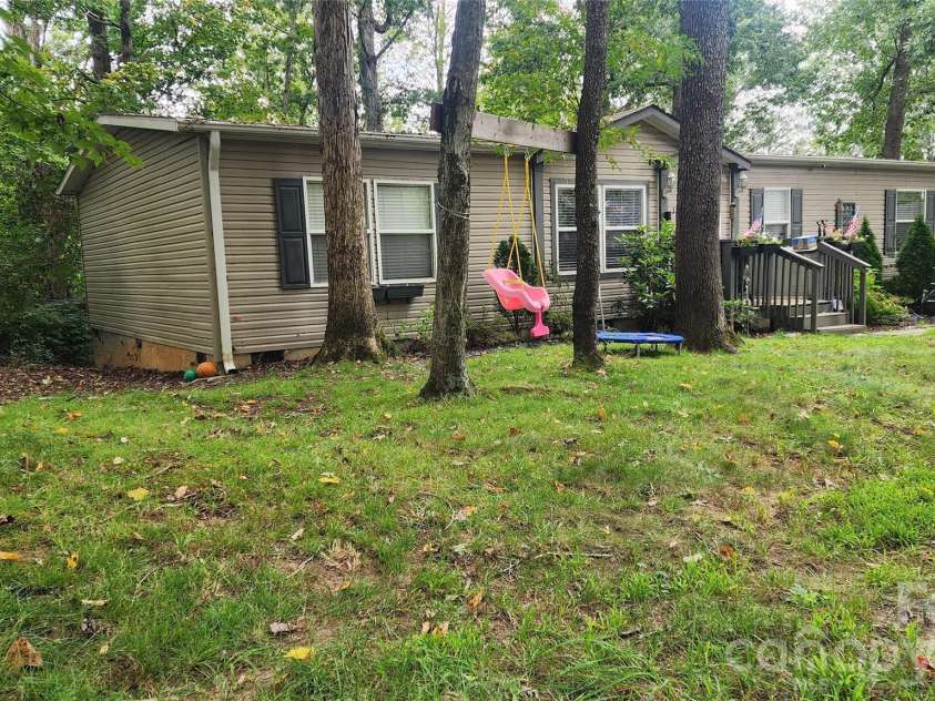 67 Indian Trail Road, Candler, NC 28715.  MLS# CAR4337508, YatesRealty ID 2159. 
