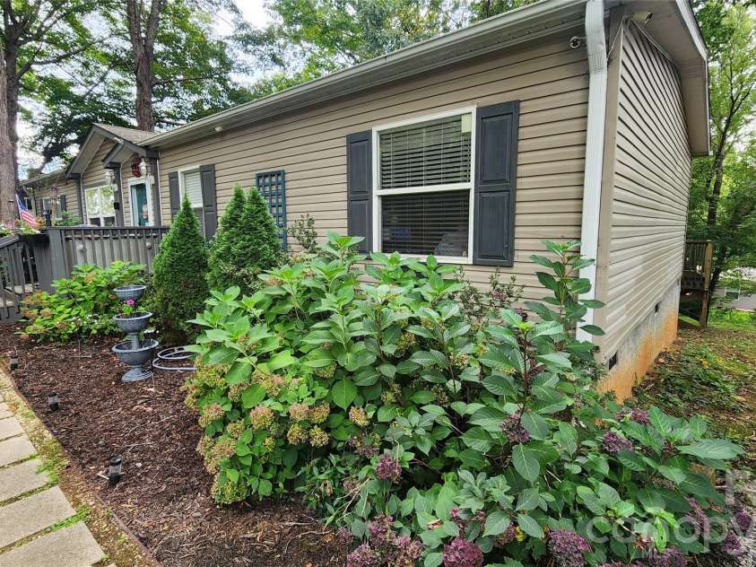 67 Indian Trail Road, Candler, NC 28715.  MLS# CAR4337508, YatesRealty ID 2159. 
