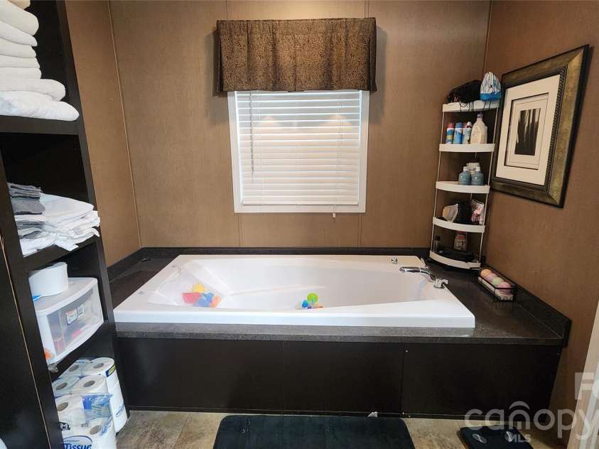 67 Indian Trail Road, Candler, NC 28715.  MLS# CAR4337508, YatesRealty ID 2159. 