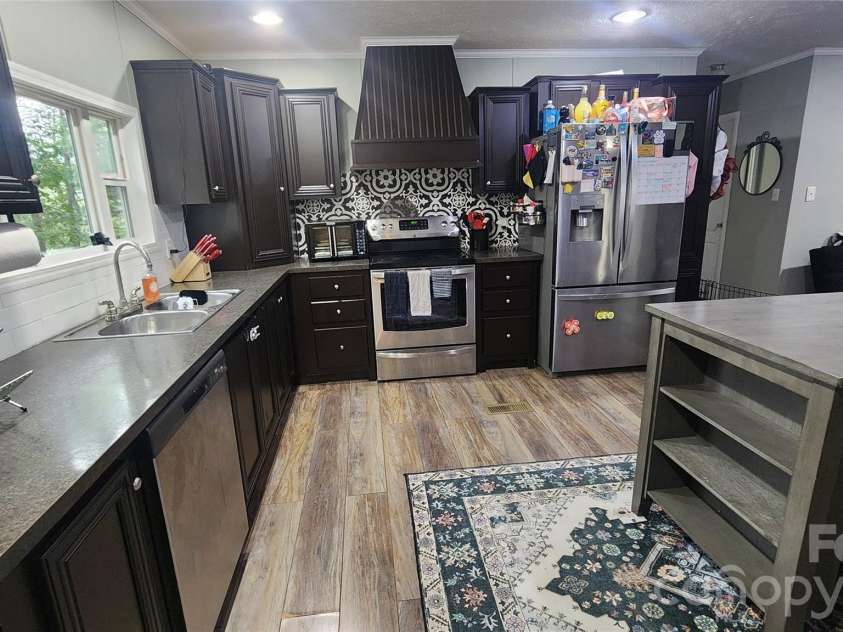 67 Indian Trail Road, Candler, NC 28715.  MLS# CAR4337508, YatesRealty ID 2159. 