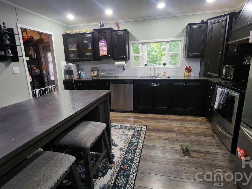 67 Indian Trail Road, Candler, NC 28715.  MLS# CAR4337508, YatesRealty ID 2159. 