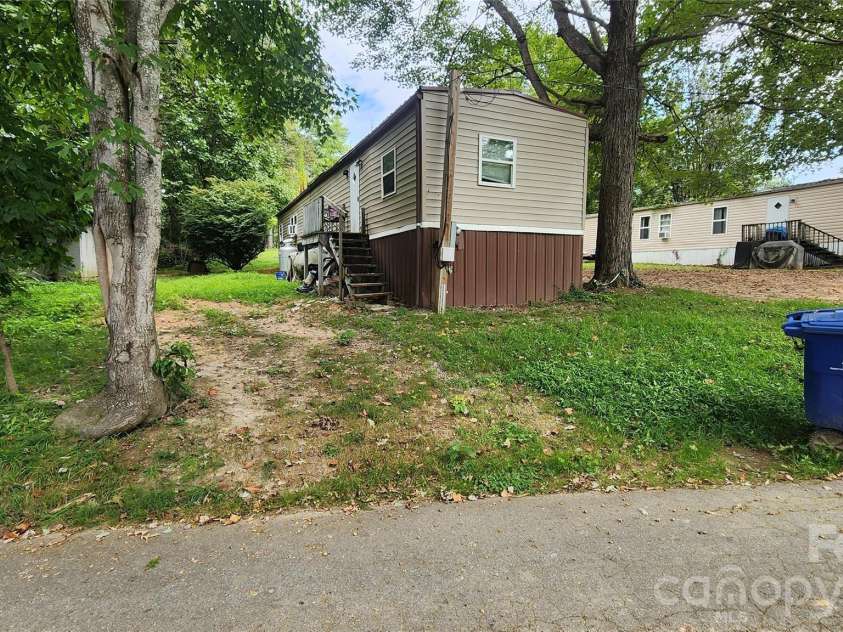 67 Indian Trail Road, Candler, NC 28715.  MLS# CAR4337508, YatesRealty ID 2159. 