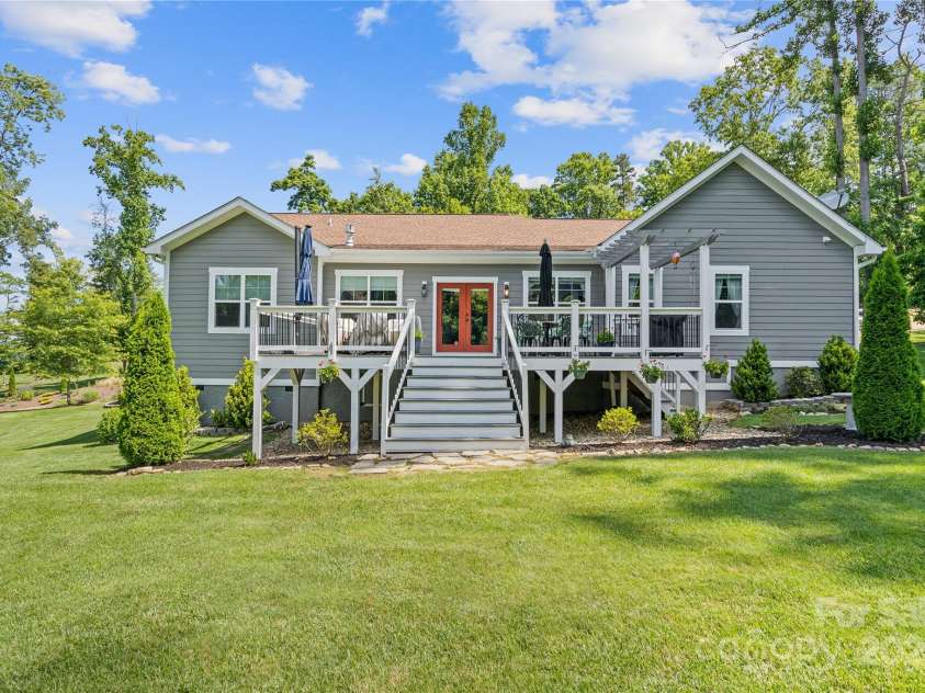 156 Olivet Lane, Fletcher, NC 28732.  MLS# CAR4272204, YatesRealty ID 21590. Back view of home