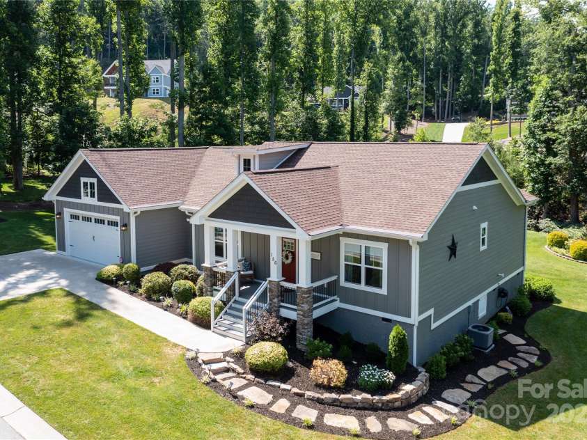 156 Olivet Lane, Fletcher, NC 28732.  MLS# CAR4272204, YatesRealty ID 21590. Beautifully landscaped with a nice covered front porch