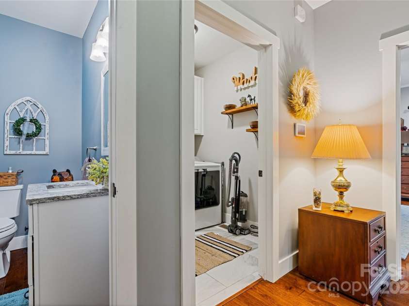156 Olivet Lane, Fletcher, NC 28732.  MLS# CAR4272204, YatesRealty ID 21590. Home entry from garage Half bath
