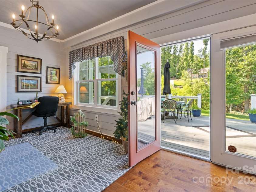 156 Olivet Lane, Fletcher, NC 28732.  MLS# CAR4272204, YatesRealty ID 21590. LShowing sunroom & door leading to the wonderful deck
