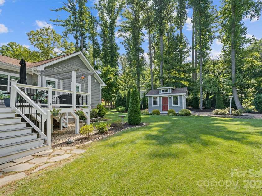 156 Olivet Lane, Fletcher, NC 28732.  MLS# CAR4272204, YatesRealty ID 21590. More back yard leading to storage shed