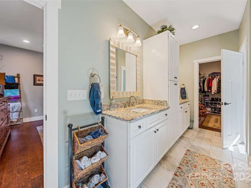 156 Olivet Lane, Fletcher, NC 28732.  MLS# CAR4272204, YatesRealty ID 21590. Nice double sink vanities with storage & center storage cabinet
